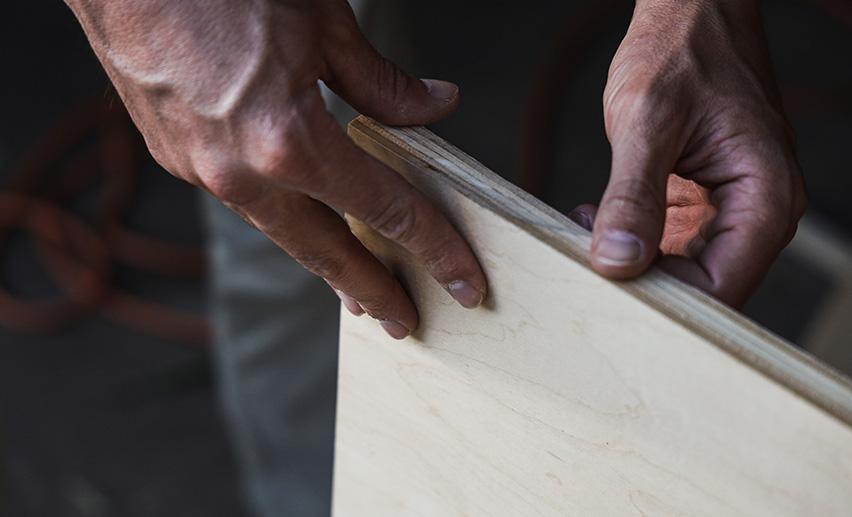 Man working iwth plywood
